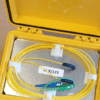 Small fibre launch box opened for connecting between an OTDR and a cable under test