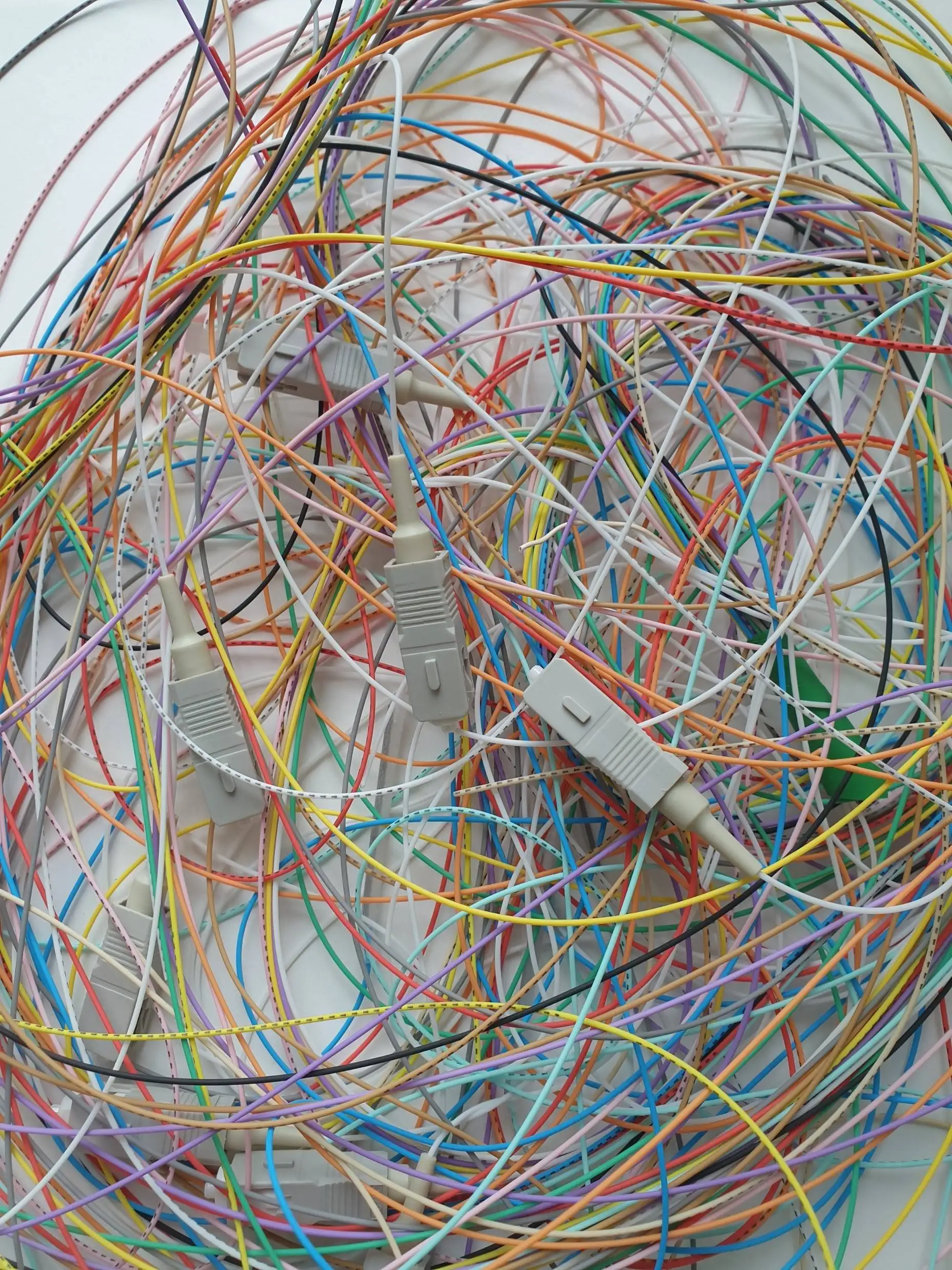 A jumble of optical fibres and connectors